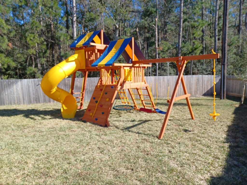 Magnolia TX swing set install 1