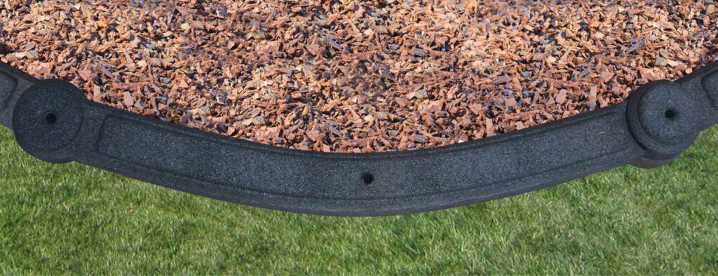 Rubber mulch border for swing set